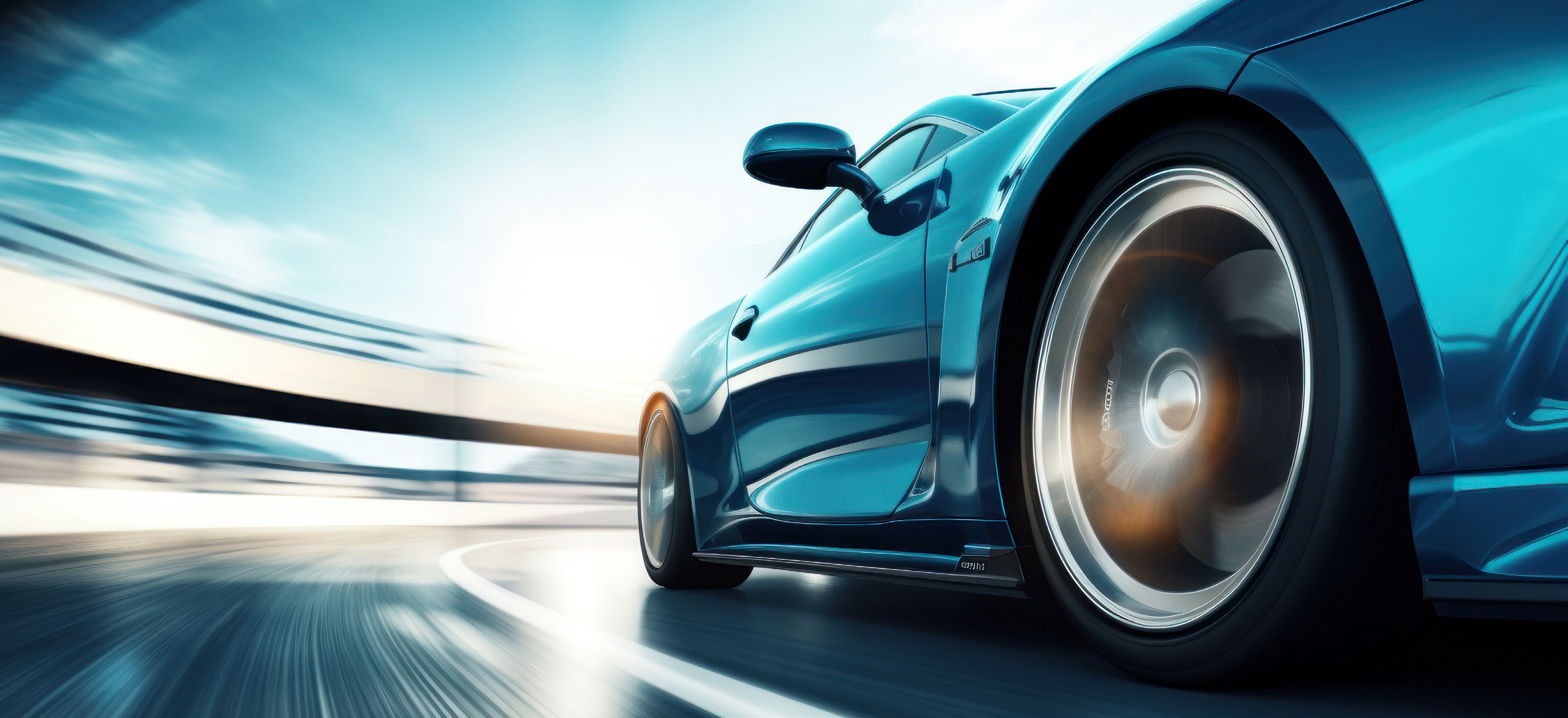 Close-up of a sports car wheel and bodywork in motion