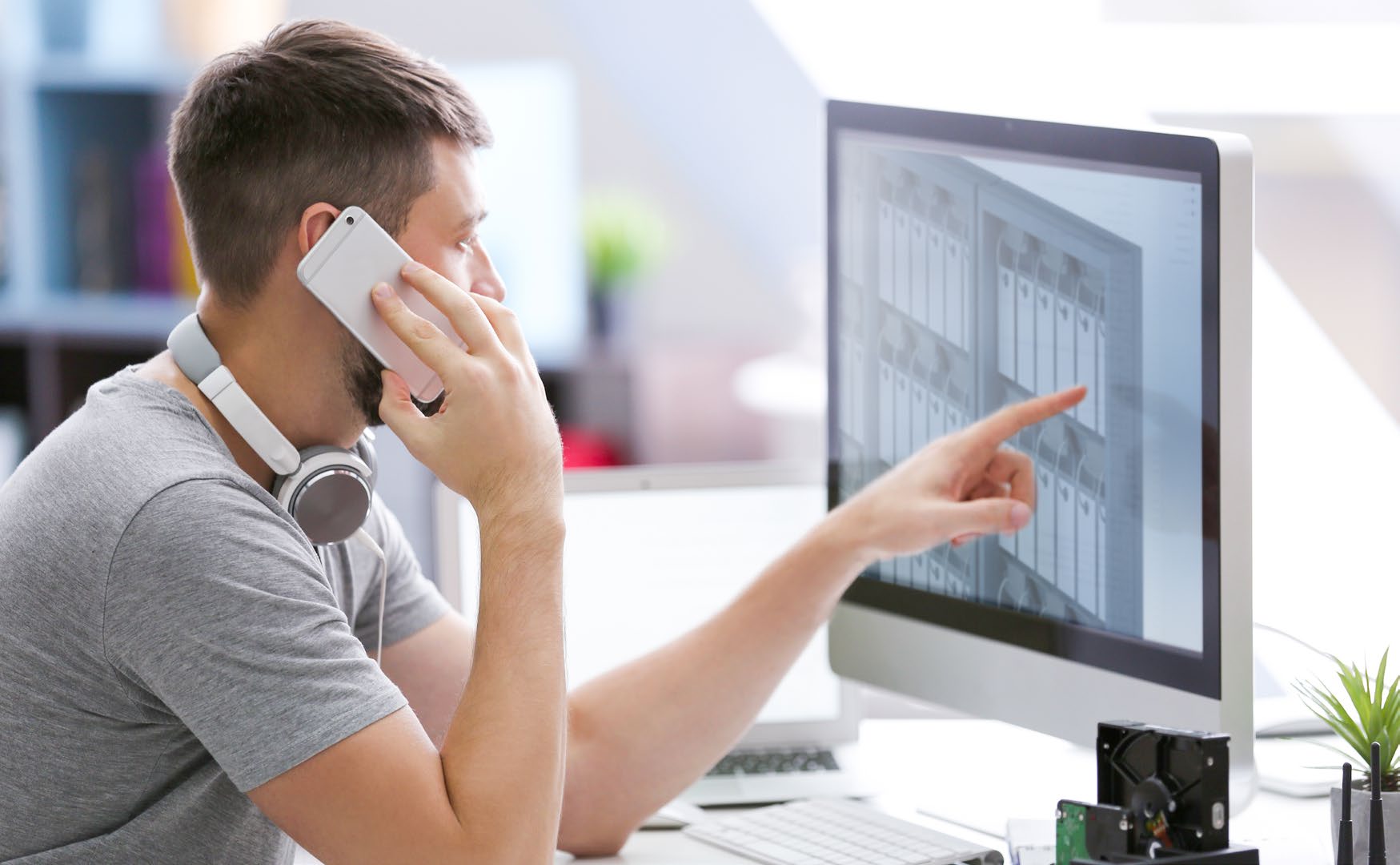 ARC team member reviewing a colour system on screen